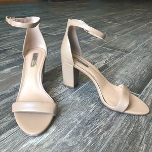 Tan INC heels with a strap around ankle